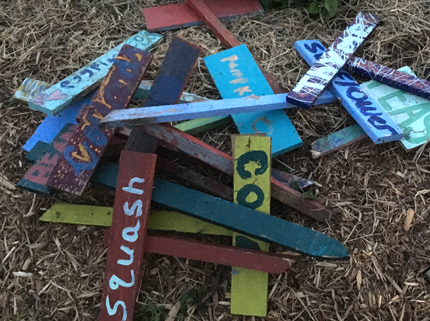 Colorful row signs for a vegetable garden 